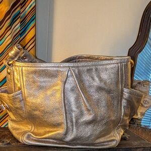 Shoplifters Delight Coach Gold Tote Bag with Glamorous Metallic Finish